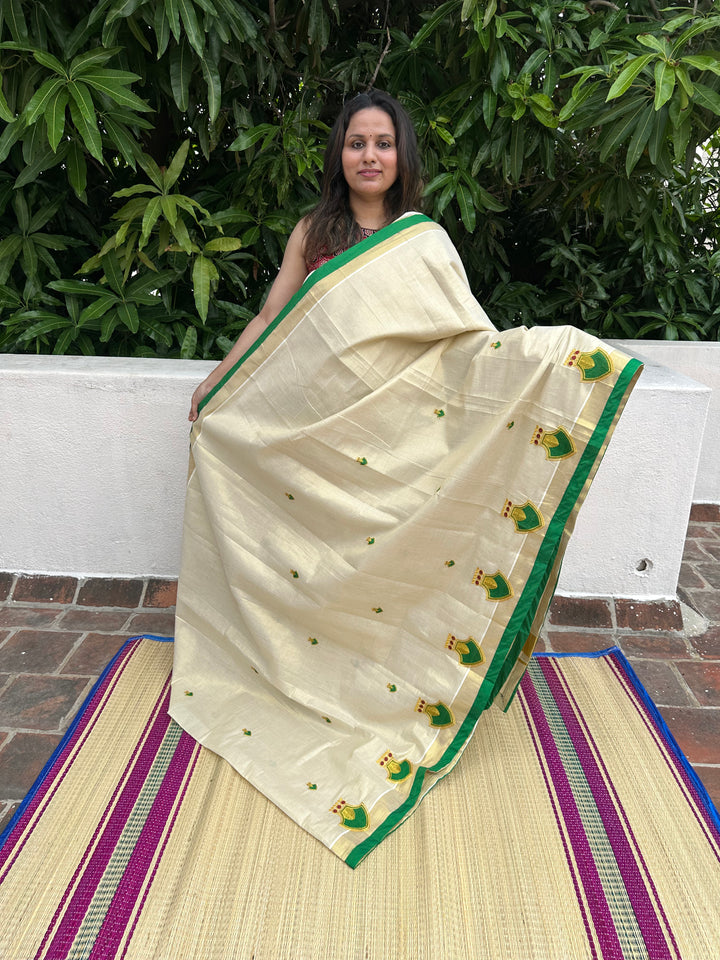 Kerala Tissue Saree With Green Palakka Embroidery Motif with Green Piping in the Border