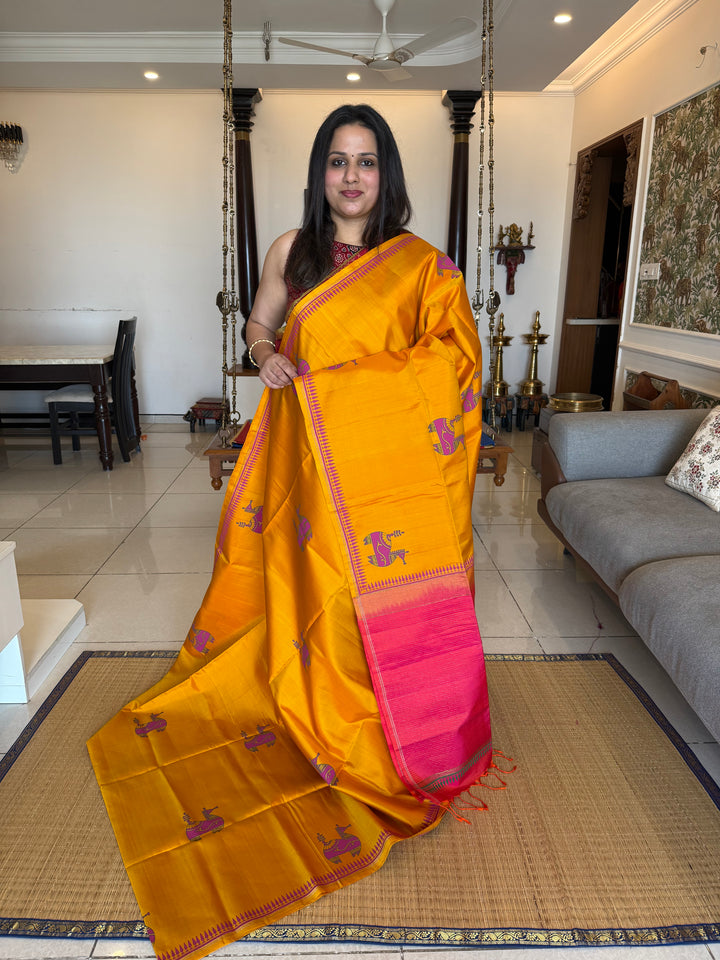 A Trendy Yellow with Pink, Handblock Printed Terracota Horse Designs in the Body , Rich Vairaoosi Pallu and Blouse Pure Soft Silk Saree