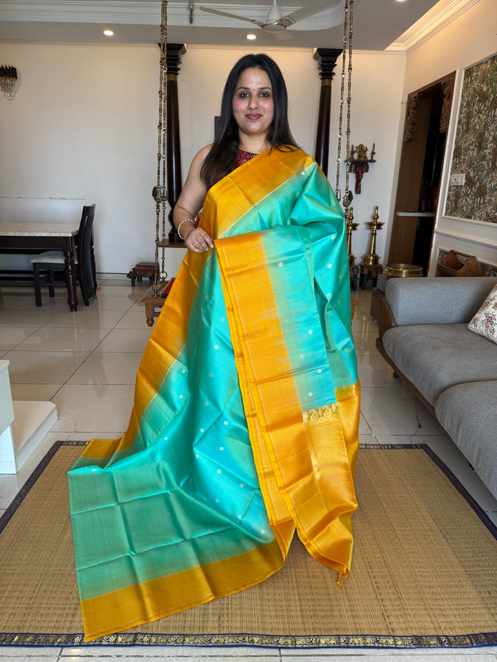 Light Rexona Green with Fenugreek , Zari Body Butta in the Body, Vairaoosi Lines in teh Borders and Rich Pallu Pure Soft Silk Saree