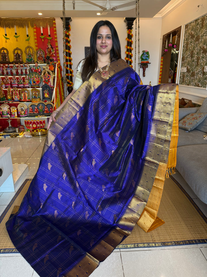 Blue with Mustard  Paithani  borders , parrot motifs in the body ,rich Pallu Korvai Silk Cotton Saree