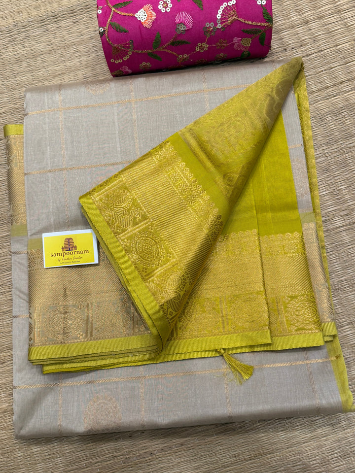 Offwhite with Lemon Yellow , rich Zari checks in the body , Mayil and Chakram butta ,traditional borders and grand Pallu Silk Cotton Saree
