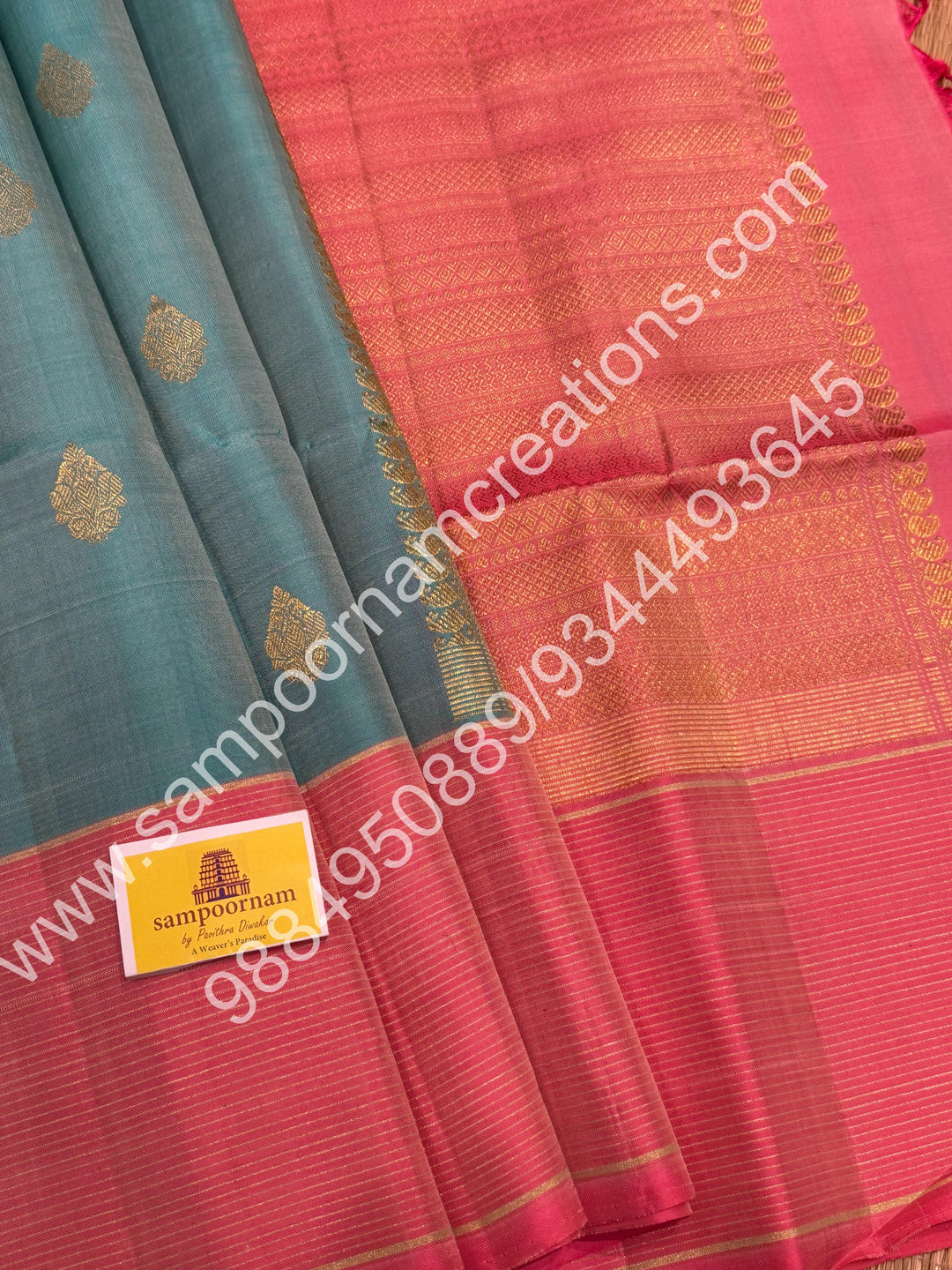 Pastel Blue with Baby Pink, Rich Butta in the body and Traditional Vairaoosi lines in the border and Grand Pallu , Pure Soft Silk Saree