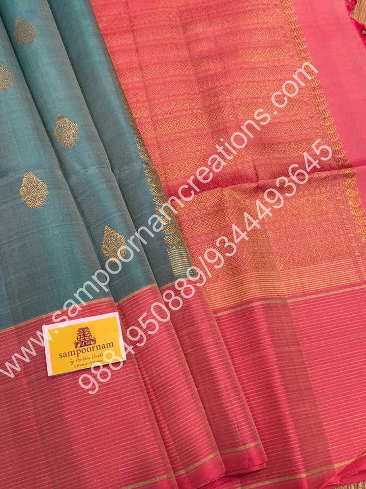 Pastel Blue with Baby Pink, Rich Butta in the body and Traditional Vairaoosi lines in the border and Grand Pallu , Pure Soft Silk Saree