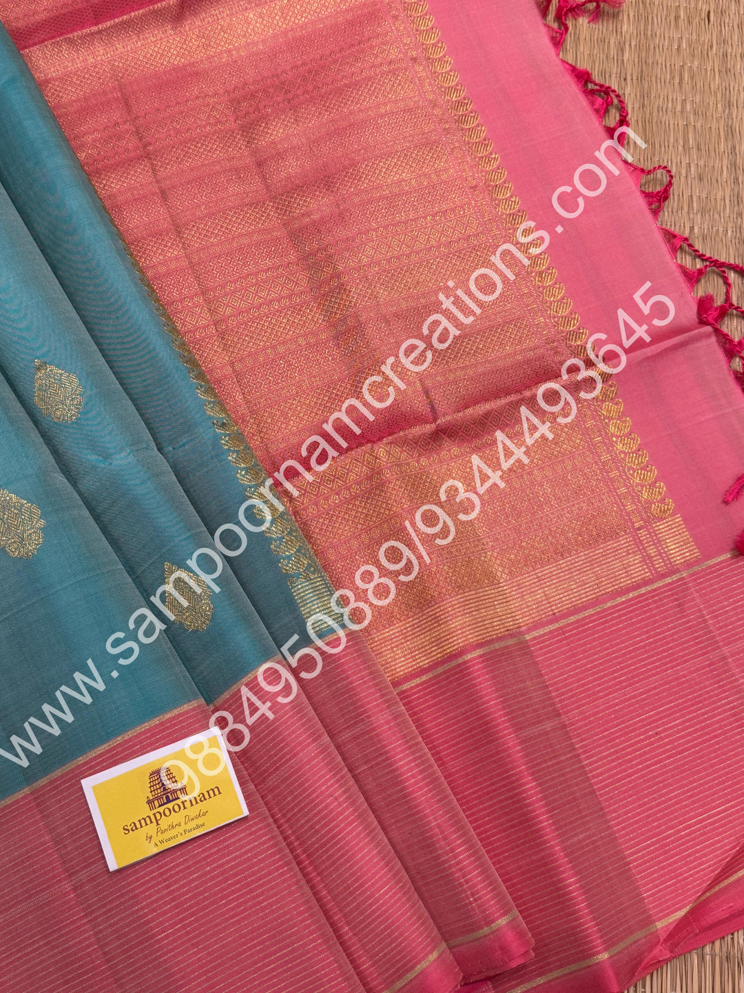 Pastel Blue with Baby Pink, Rich Butta in the body and Traditional Vairaoosi lines in the border and Grand Pallu , Pure Soft Silk Saree
