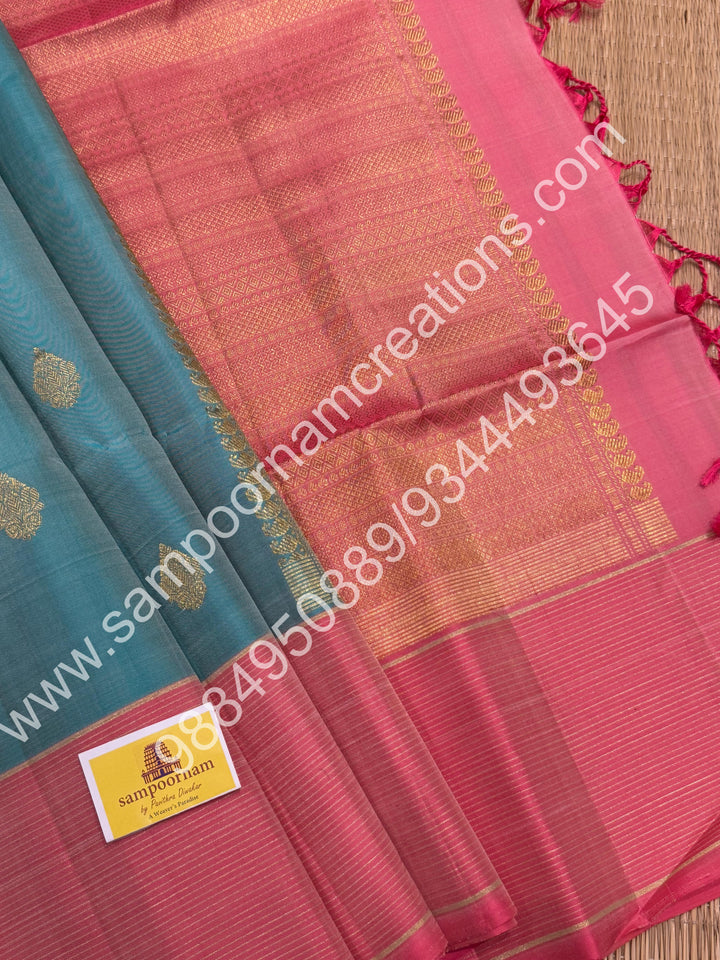 Pastel Blue with Baby Pink, Rich Butta in the body and Traditional Vairaoosi lines in the border and Grand Pallu , Pure Soft Silk Saree