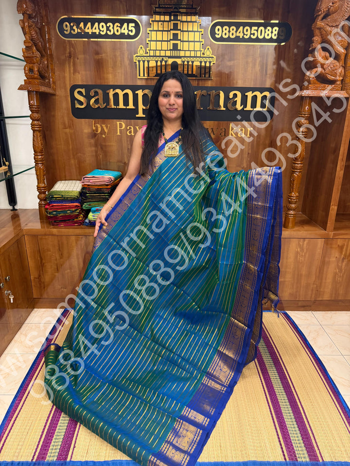 Double Shaded Teel Blue with Blue , Veldhari Zari Lines in the Body , Traditional Kanchi border , Rich Pallu , Pure Silk Cotton Saree