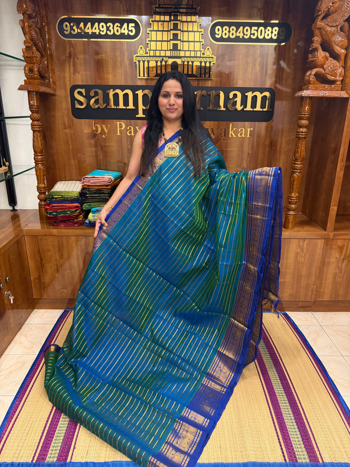 Double Shaded Teel Blue with Blue , Veldhari Zari Lines in the Body , Traditional Kanchi border , Rich Pallu , Pure Silk Cotton Saree