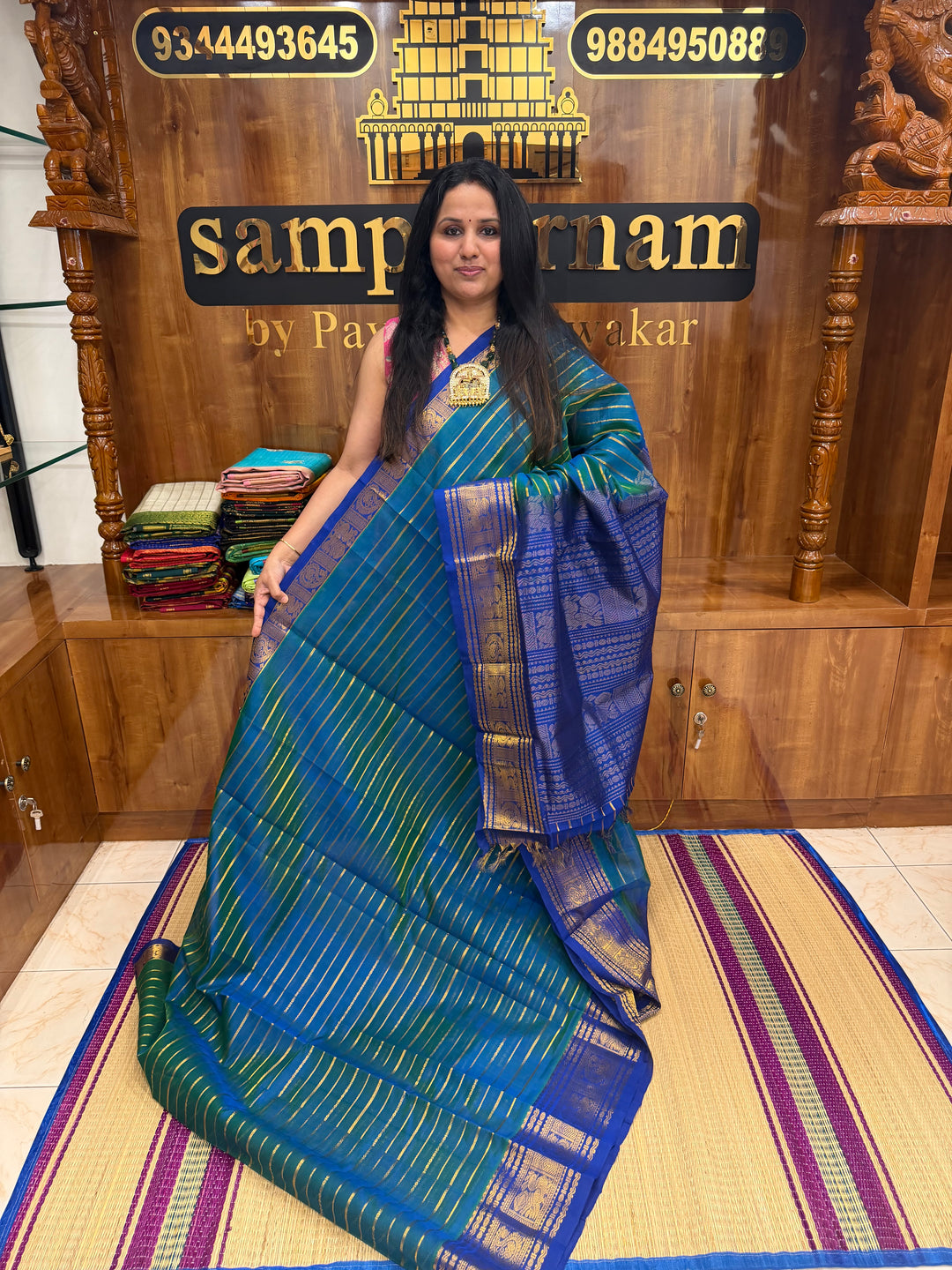 Double Shaded Teel Blue with Blue , Veldhari Zari Lines in the Body , Traditional Kanchi border , Rich Pallu , Pure Silk Cotton Saree