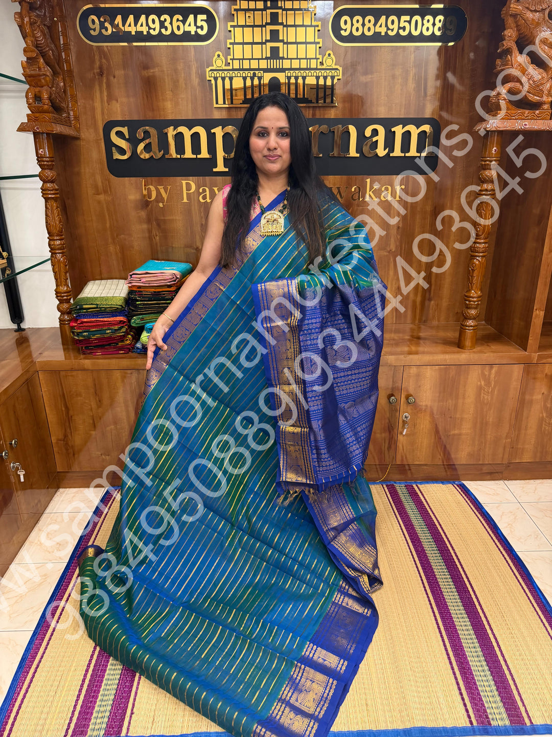 Double Shaded Teel Blue with Blue , Veldhari Zari Lines in the Body , Traditional Kanchi border , Rich Pallu , Pure Silk Cotton Saree