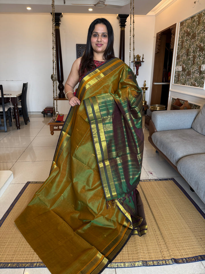 Fenugreek Green with Dark Green Rettapet Border and Zari Butta in the Body Traditional Borders and Rich Pallu Pure Silk Cotton Saree