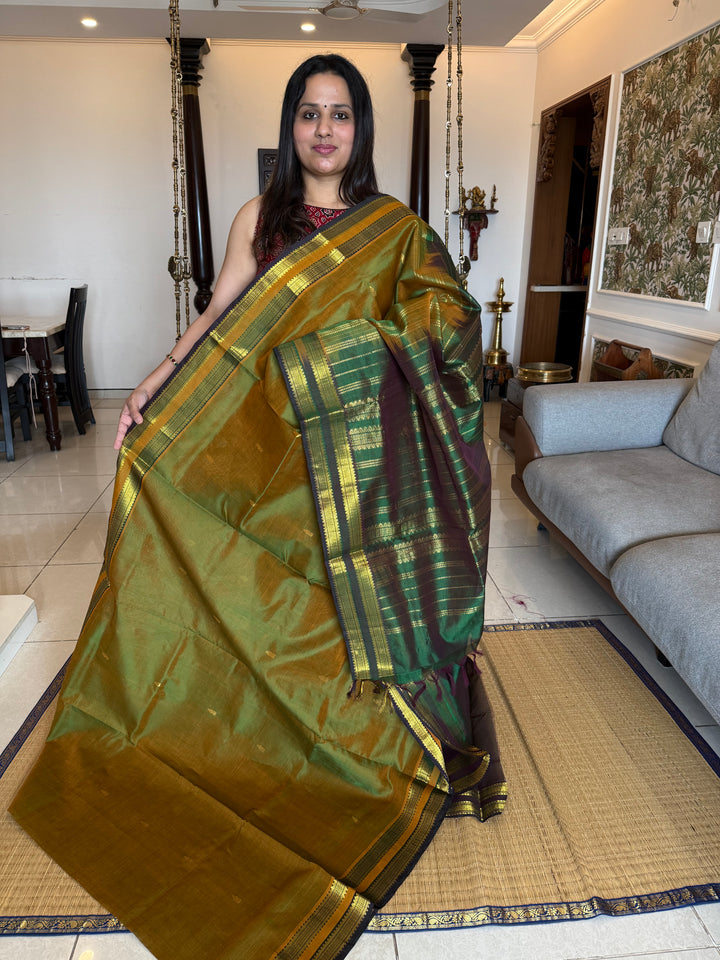 Fenugreek Green with Dark Green Rettapet Border and Zari Butta in the Body Traditional Borders and Rich Pallu Pure Silk Cotton Saree