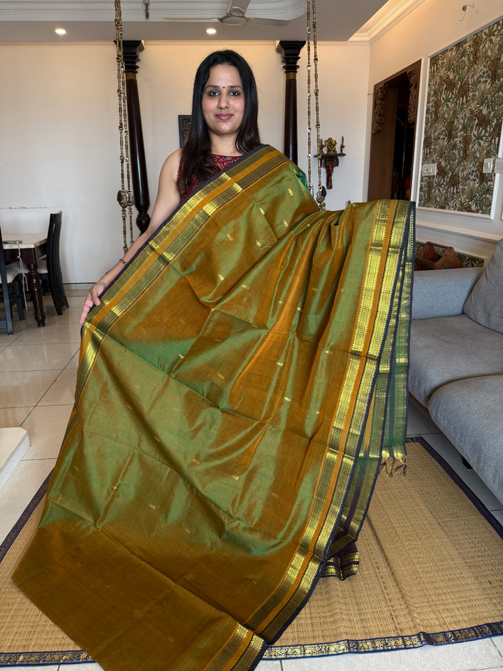 Fenugreek Green with Dark Green Rettapet Border and Zari Butta in the Body Traditional Borders and Rich Pallu Pure Silk Cotton Saree
