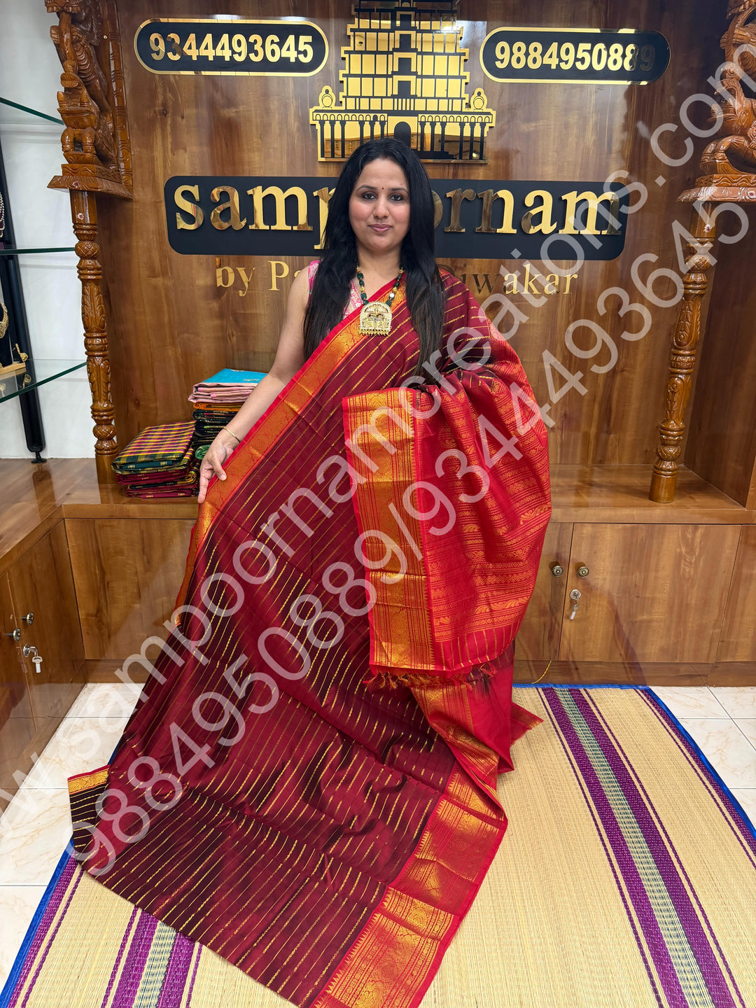 Dark Maroon with Red , Veldhari Zari Lines in the Body , Traditional Kanchi border , Rich Pallu , Pure Silk Cotton Saree