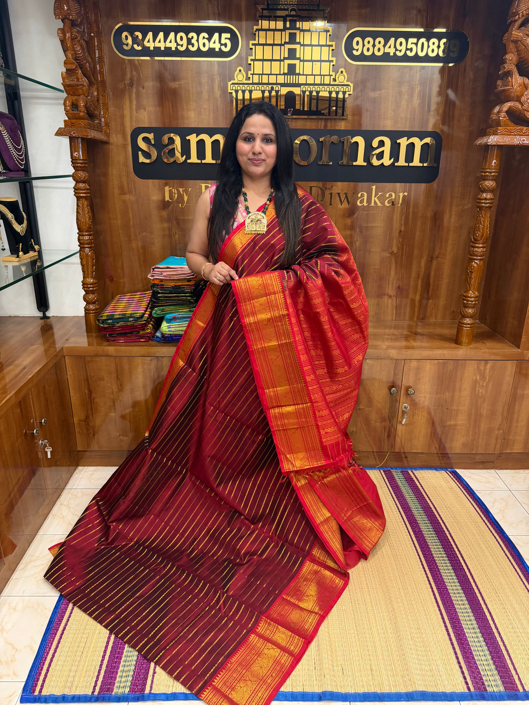 Dark Maroon with Red , Veldhari Zari Lines in the Body , Traditional Kanchi border , Rich Pallu , Pure Silk Cotton Saree