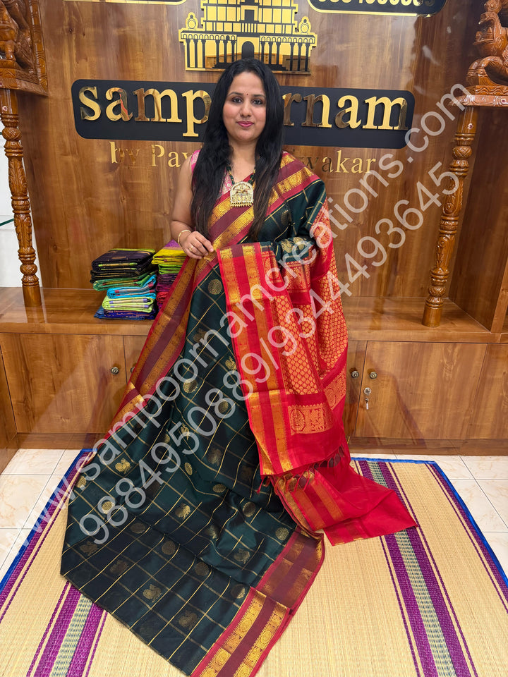 Bottle Green with Red  , Rich Mayil and Chakram butta in the body with Zari Checks , Traditional borders and Rich Pallu Pure Silk Cotton Saree