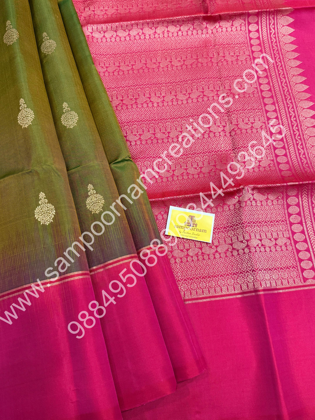 Mehandi green with Dark Pink ,Rich Zari Butta in the body , Simple Borders and Grand Pallu , Pure Soft Silk Saree