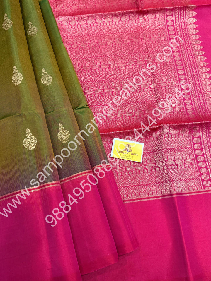 Mehandi green with Dark Pink ,Rich Zari Butta in the body , Simple Borders and Grand Pallu , Pure Soft Silk Saree