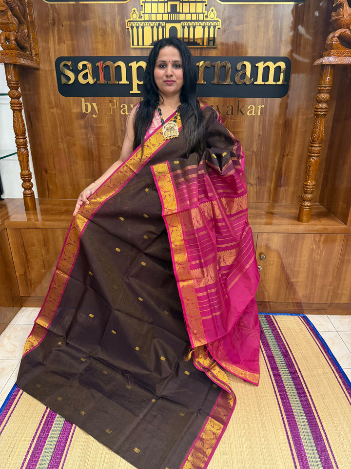 Coffee Brown with Pink ,  Vairaoosi Zari lines with Rich Annam  Zari Butta in the body , traditional borders and Rich Pallu Pure Silk Cotton Saree