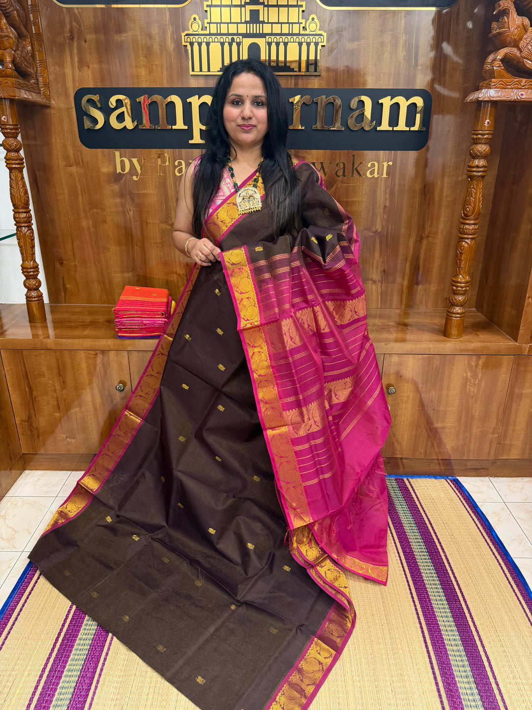 Coffee Brown with Pink ,  Vairaoosi Zari lines with Rich Annam  Zari Butta in the body , traditional borders and Rich Pallu Pure Silk Cotton Saree