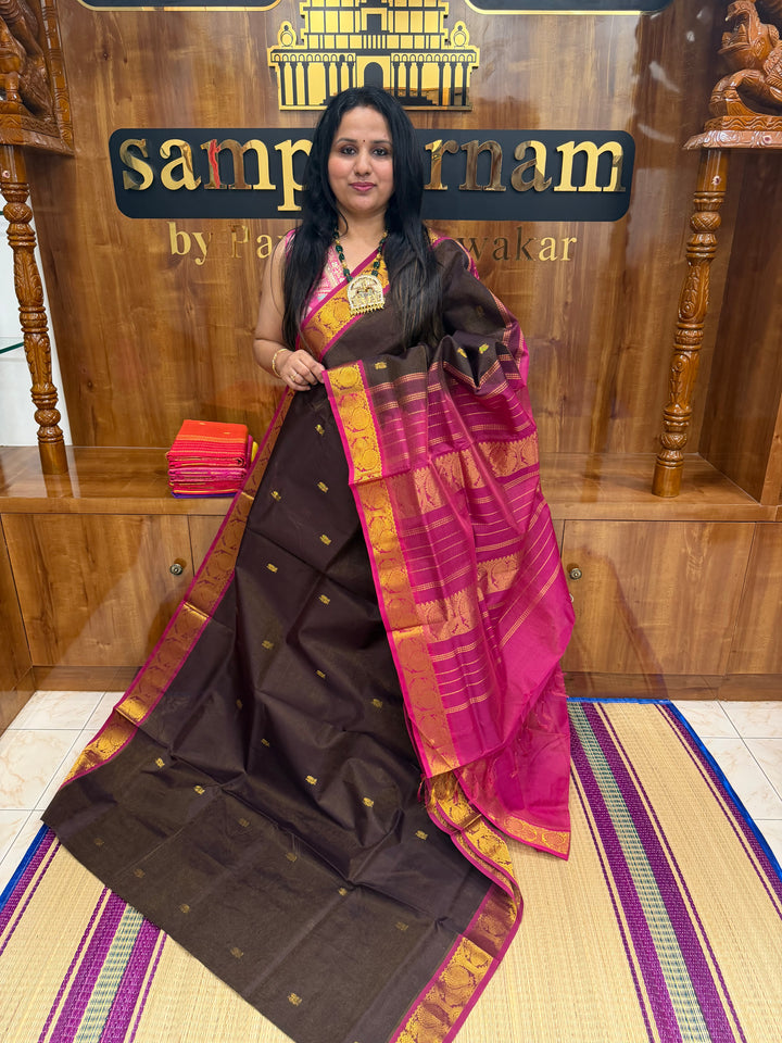 Coffee Brown with Pink ,  Vairaoosi Zari lines with Rich Annam  Zari Butta in the body , traditional borders and Rich Pallu Pure Silk Cotton Saree