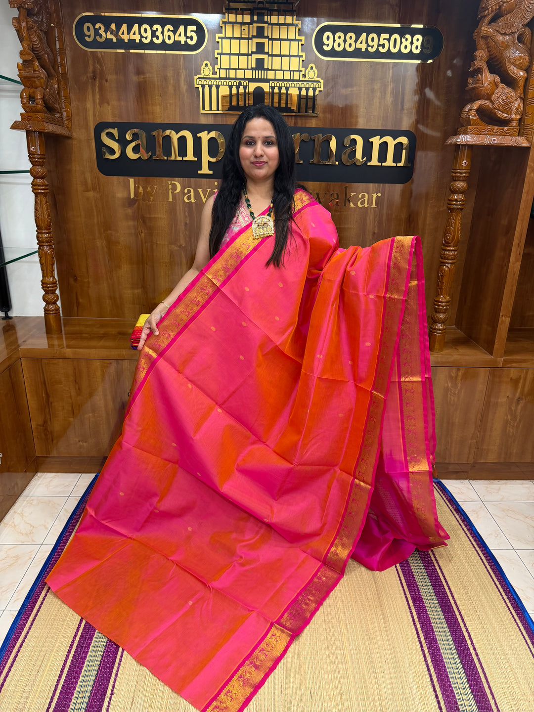Reddish Pink with Pink  ,  Rich  Zari Butta in the body , traditional borders and Rich Pallu Pure Silk Cotton Saree