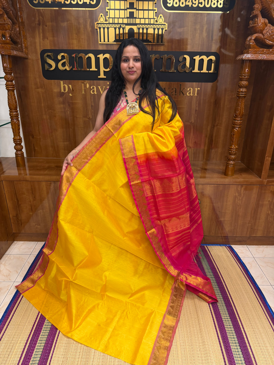 Manjal with Red ,  Rich  Zari Butta in the body , traditional borders and Rich Pallu Pure Silk Cotton Saree