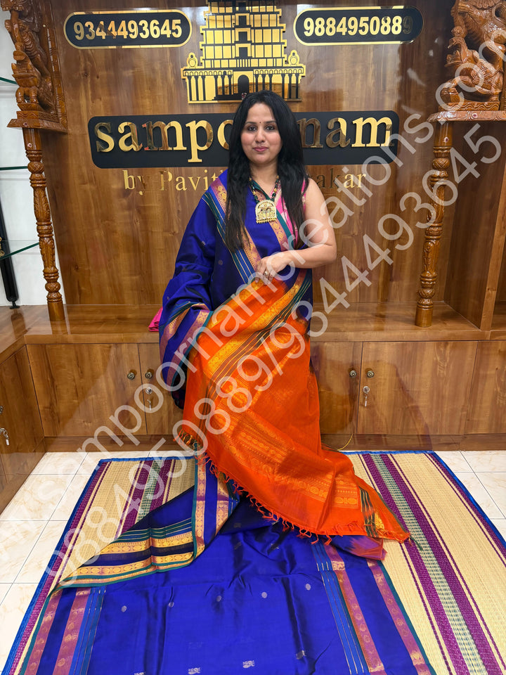 MS Blue with Orange , Annam & Rudhraksh  Butta in the body  , Rettapet  border and Rich Pallu , 10 Yards  Pure Silk Cotton Saree