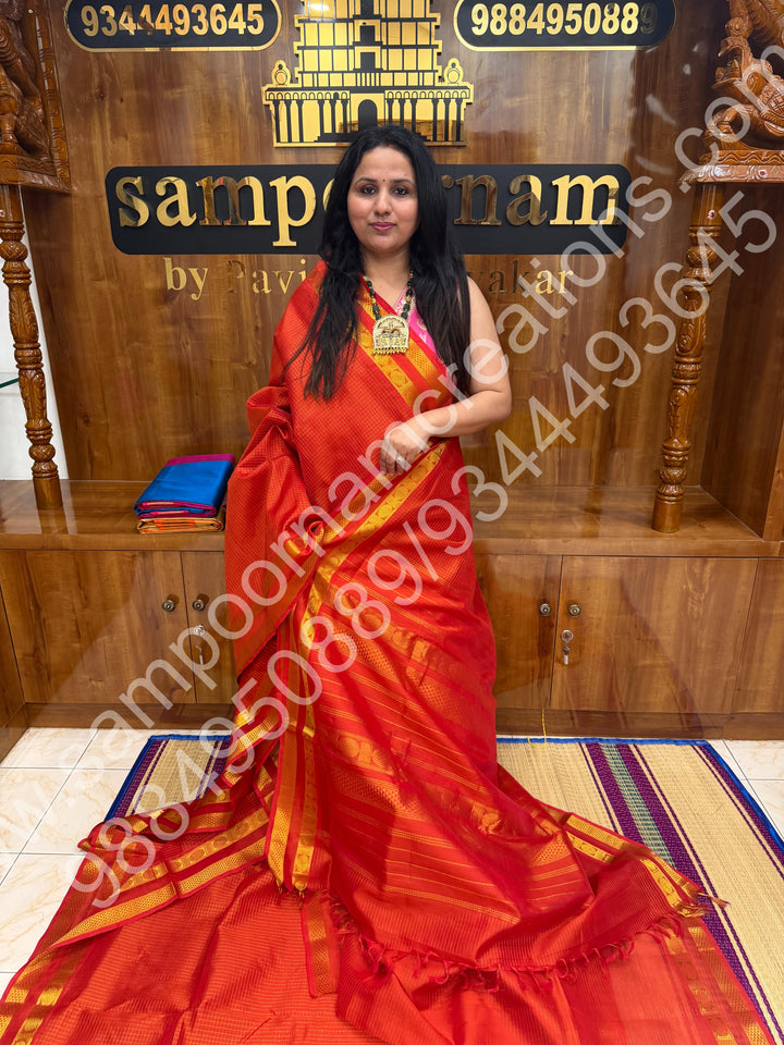 Rust Orange , Zari checks  in the body  , Rettapet  border and Rich Pallu , 10 Yards  Pure Silk Cotton Saree