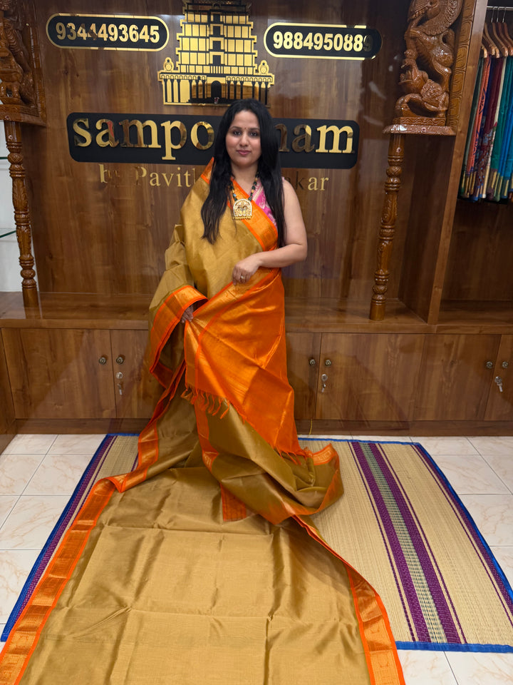Gold with Orange , Vairaoosi Zari Lines  in the body  , Traditional border and Rich Pallu , 10 Yards  Pure Silk Cotton Saree