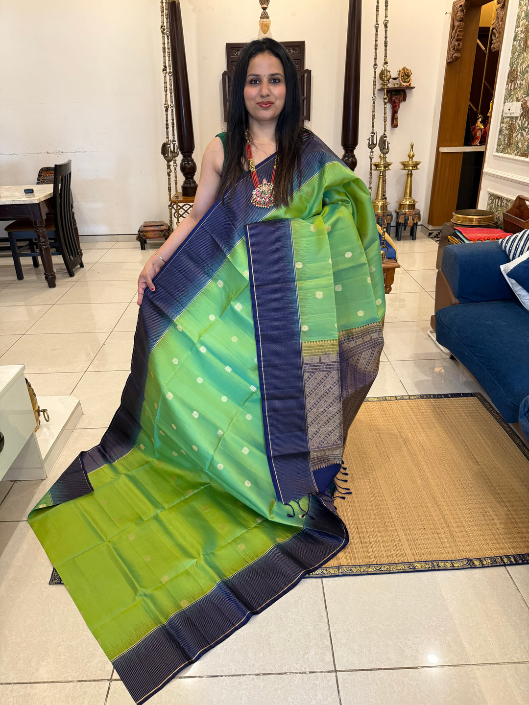 Pastel Green with Blue, Rich annam and chakram butta in the body, Vairaoosi Zari Lines in the border and Grand Pallu Pure Soft Silk Saree