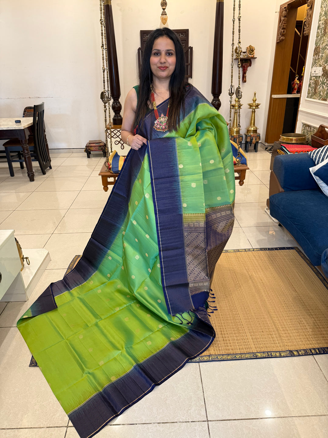 Pastel Green with Blue, Rich annam and chakram butta in the body, Vairaoosi Zari Lines in the border and Grand Pallu Pure Soft Silk Saree