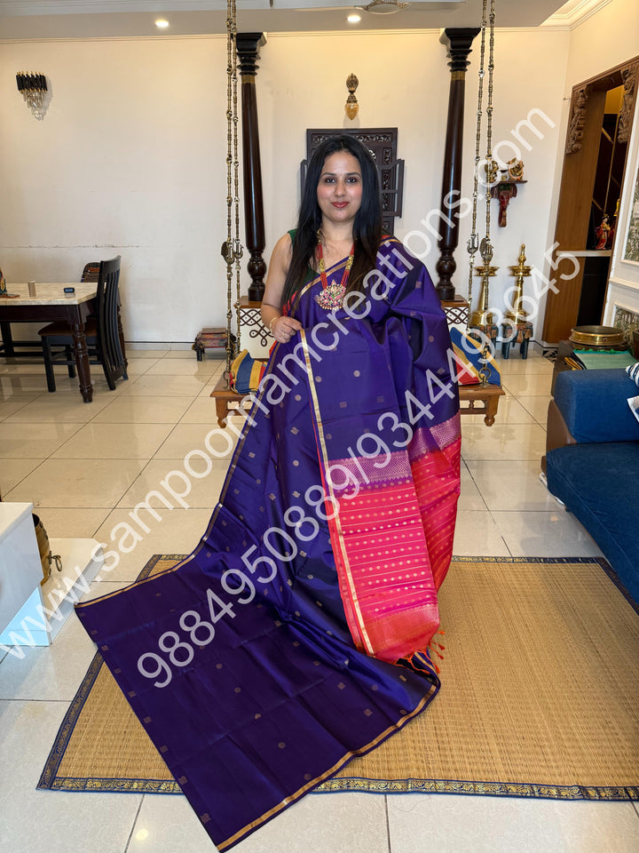 Dark Indigo Blue with Orangish Pink ,Small Zari Border, Zari butta in the Body and Grand Pallu , Pure Soft Silk Saree