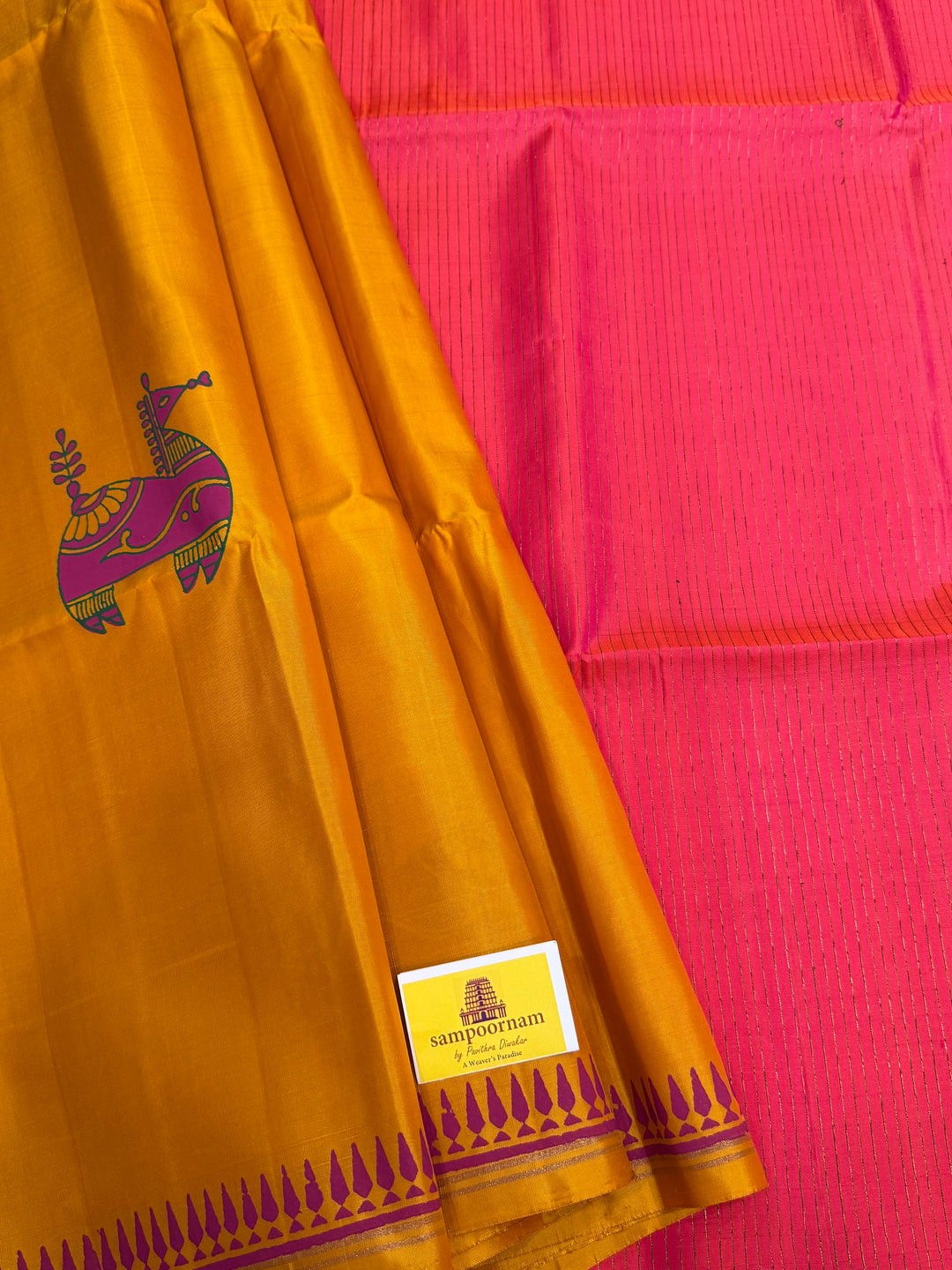 A Trendy Yellow with Pink, Handblock Printed Terracota Horse Designs in the Body , Rich Vairaoosi Pallu and Blouse Pure Soft Silk Saree