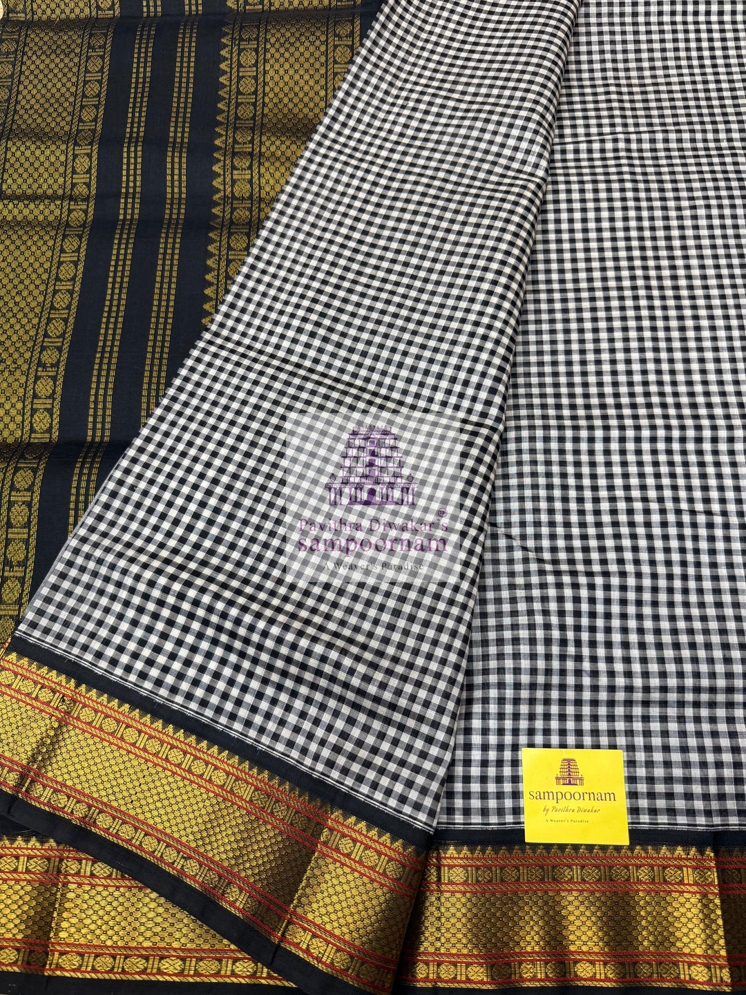 Black white Podi Kattam with Traditional Borders and Rich Pallu Korvai Silk Cotton Saree