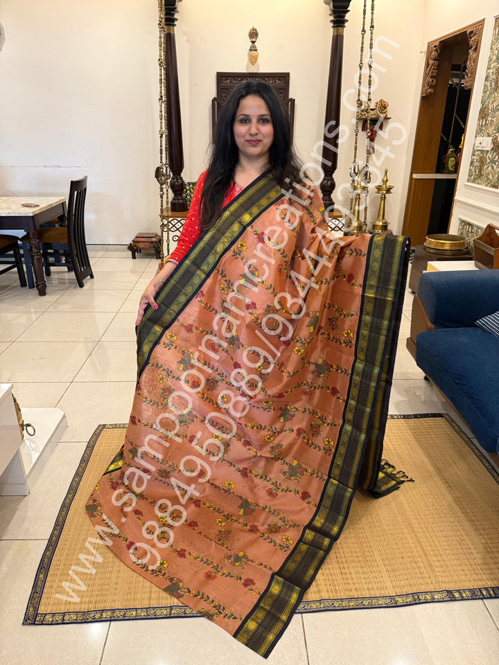 Dark Biscuit with Black , rettapet traditional border , Madhubani Floral print in the body and rich Pallu Printed Korvai Silk Cotton Saree