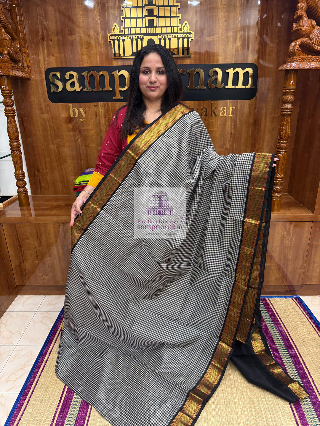 Black white Podi Kattam with Traditional Borders and Rich Pallu Korvai Silk Cotton Saree