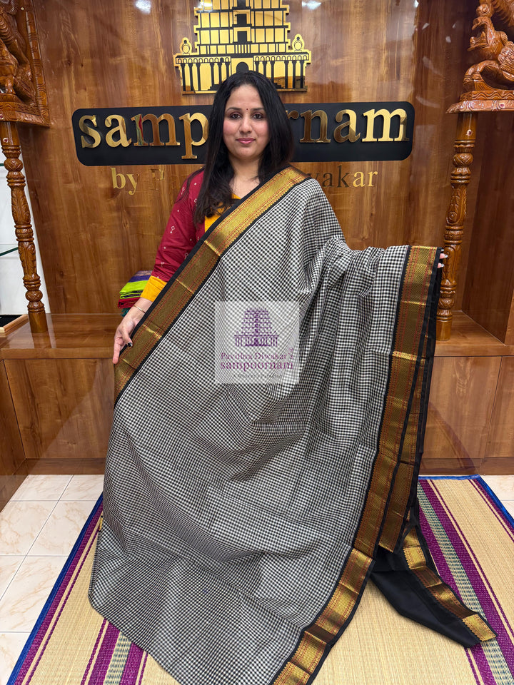 Black white Podi Kattam with Traditional Borders and Rich Pallu Korvai Silk Cotton Saree