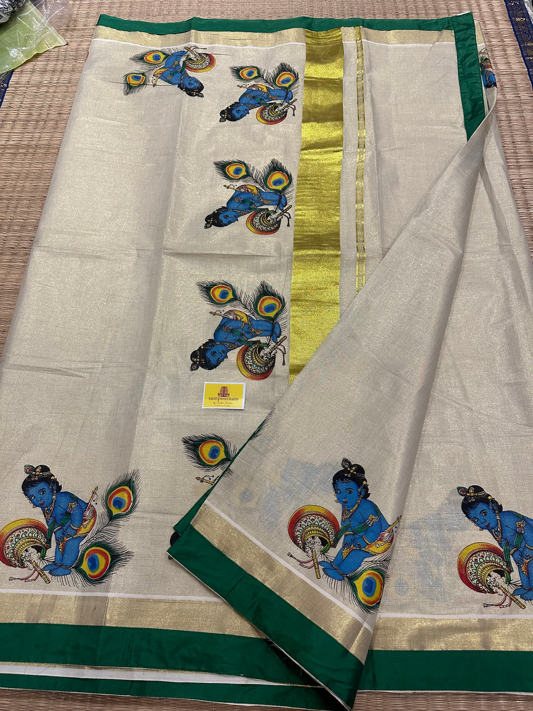 Kerala Tissue Saree with Baby Butter Krishna Motif and Green Piping in Borders