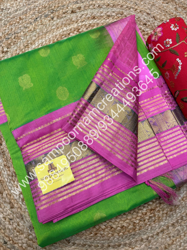 Light Green with Baby Pink , rich Mayil and Chakram zari butta in the body , Kanchi traditional border and  rich Pallu Korvai Silk Cotton Saree