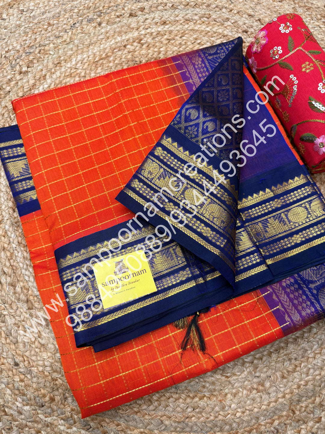 Rust Orange with Dark Blue  , rich Zari checks in the body , traditional borders and rich Pallu Korvai Silk Cotton