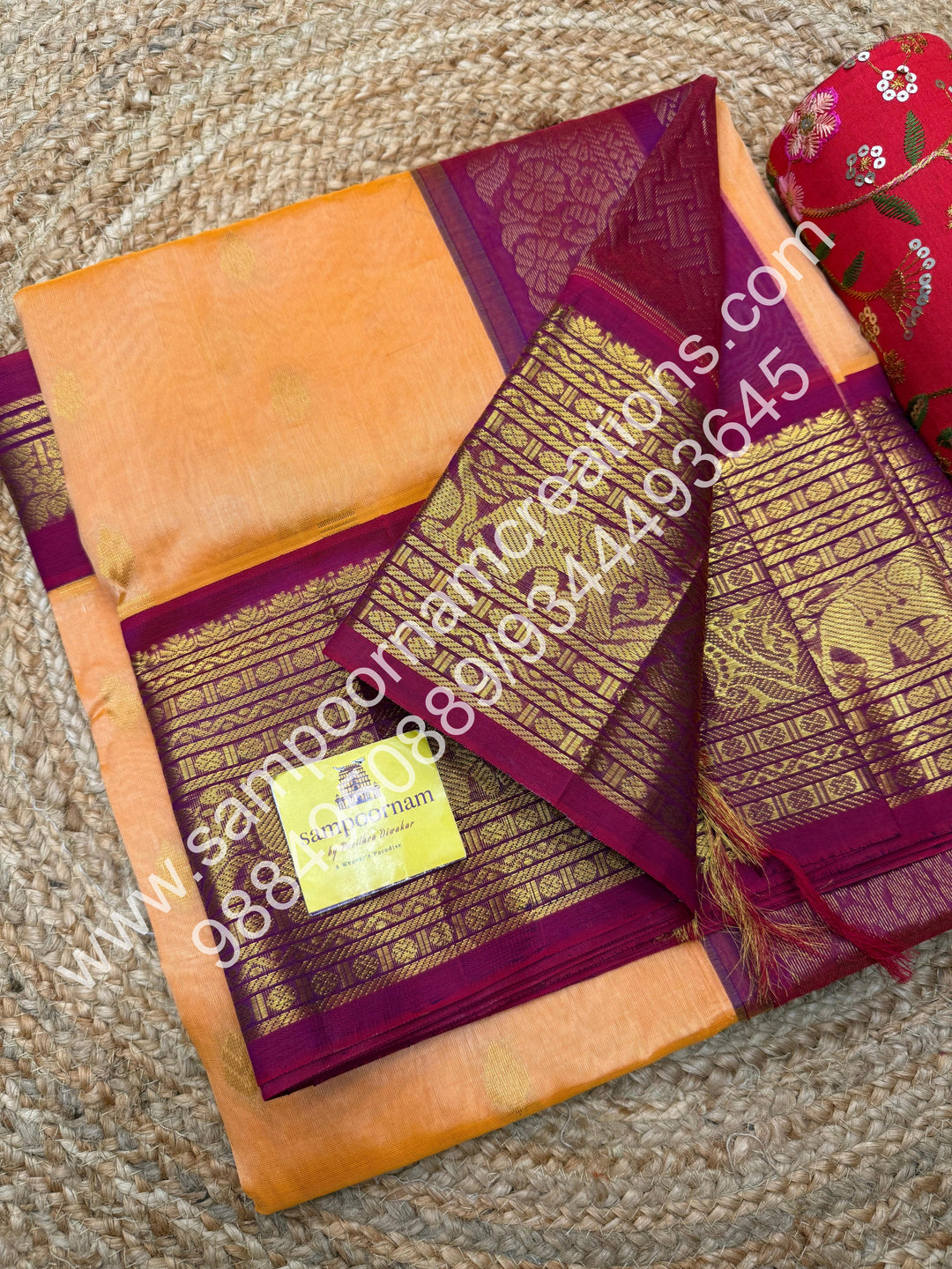 Peach with Dark Magenta , Floral  Zari butta in the body , One side big kanchi border and rich Pallu Korvai Silk Cotton Saree