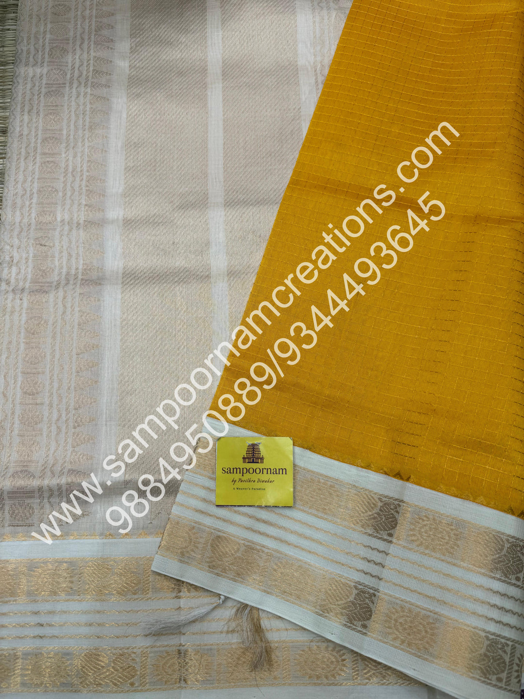 Yellow with Offwhite  , rich Zari checks in the body , rettapet  borders and rich Pallu Korvai Silk Cotton