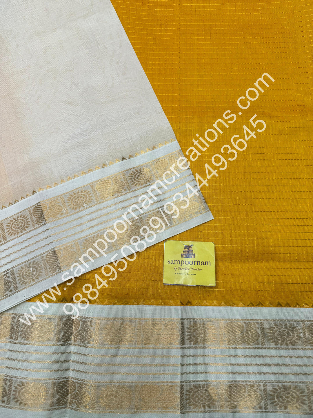 Yellow with Offwhite  , rich Zari checks in the body , rettapet  borders and rich Pallu Korvai Silk Cotton