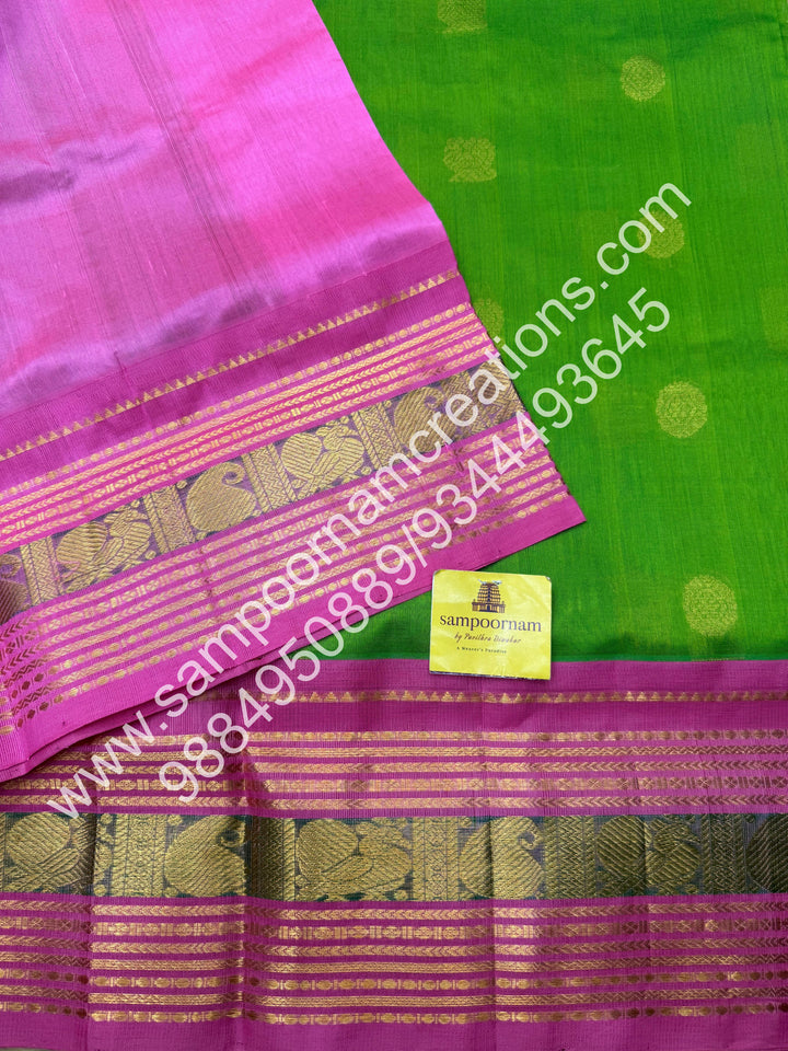 Light Green with Baby Pink , rich Mayil and Chakram zari butta in the body , Kanchi traditional border and  rich Pallu Korvai Silk Cotton Saree