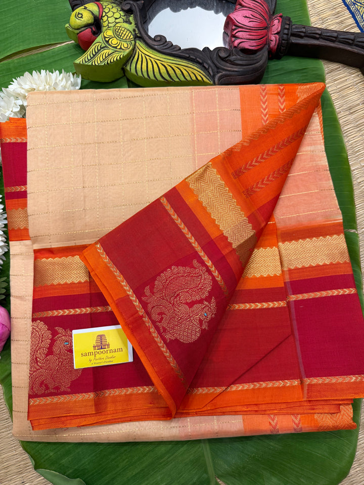 Biscuit Colour with Orange and Red,with Annam Motifs in the Border and Zari checks in the Body and Rich Pallu Korvai Silk Cotton Saree