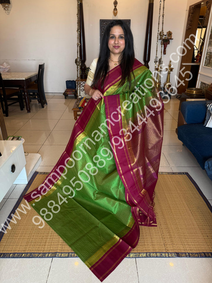 Parrot Green with Magenta  , Zari checks in the body and rettapet border, rich Pallu Korvai  Silk Cotton Saree