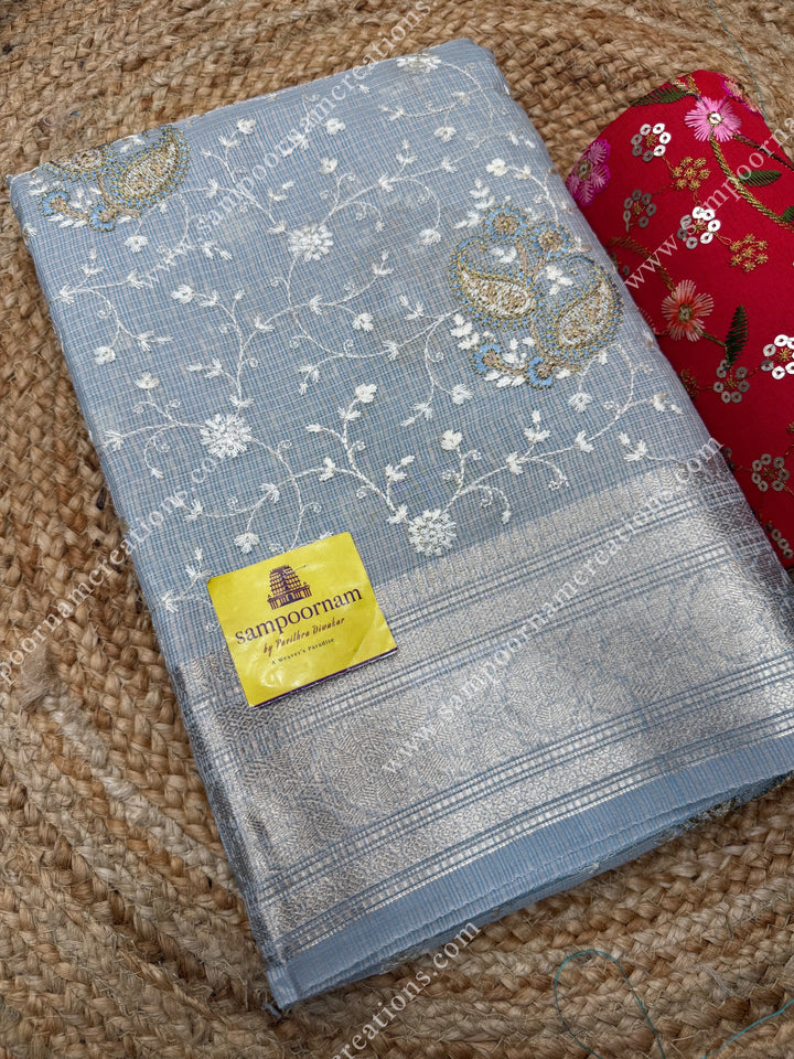 Pastel Blue , Mango and Floral  Embroidery in the body , Banarasi Border and Pallu Semi Kota Tissue Saree