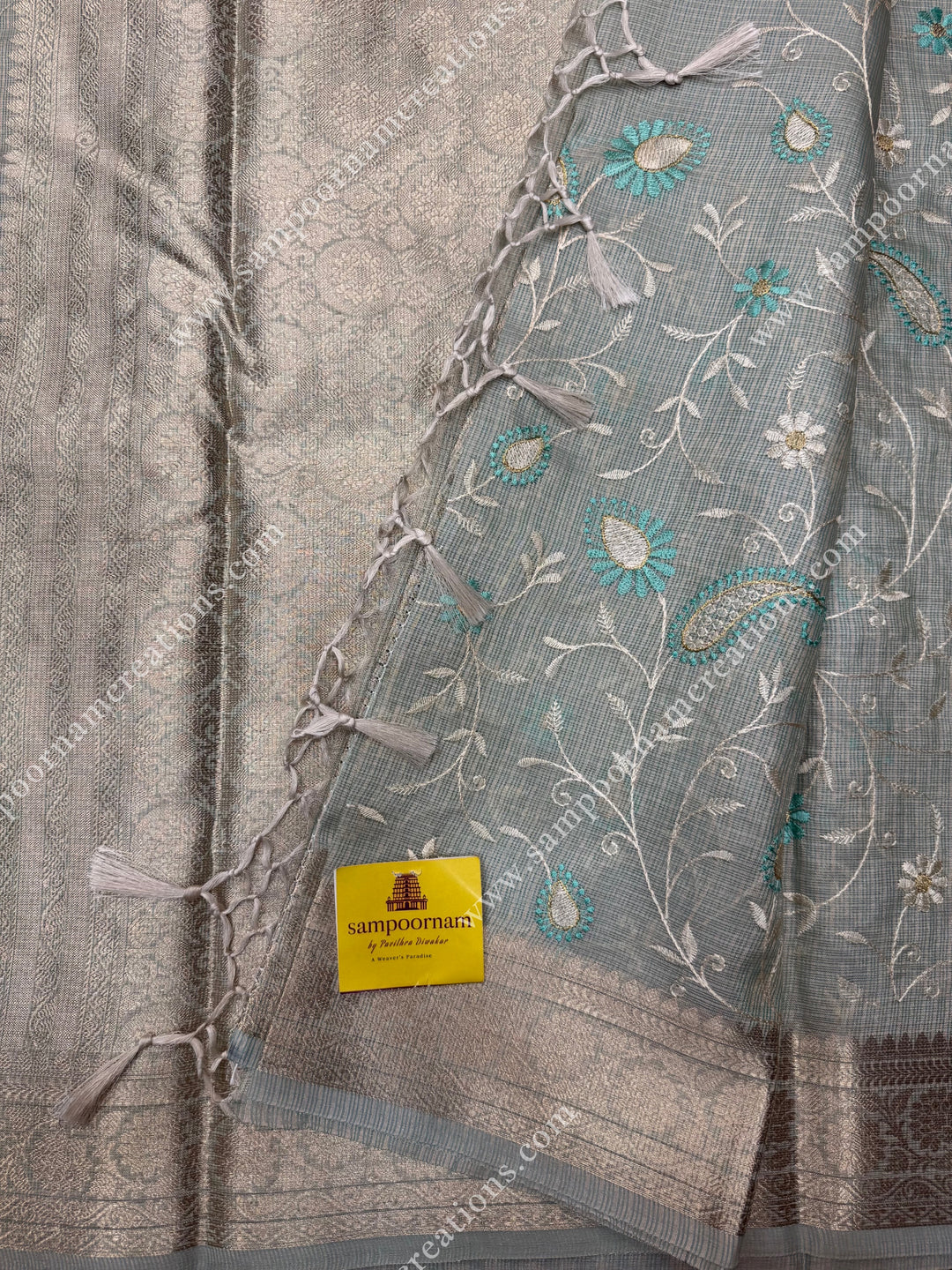 Pastel Green , Mango and Floral  Embroidery in the body , Banarasi Border and Pallu Semi Kota Tissue Saree.