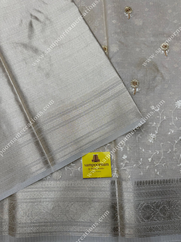 Offwhite with Mango and Floral  Embroidery in the body , Banarasi Border and Pallu Semi Kota Tissue Saree