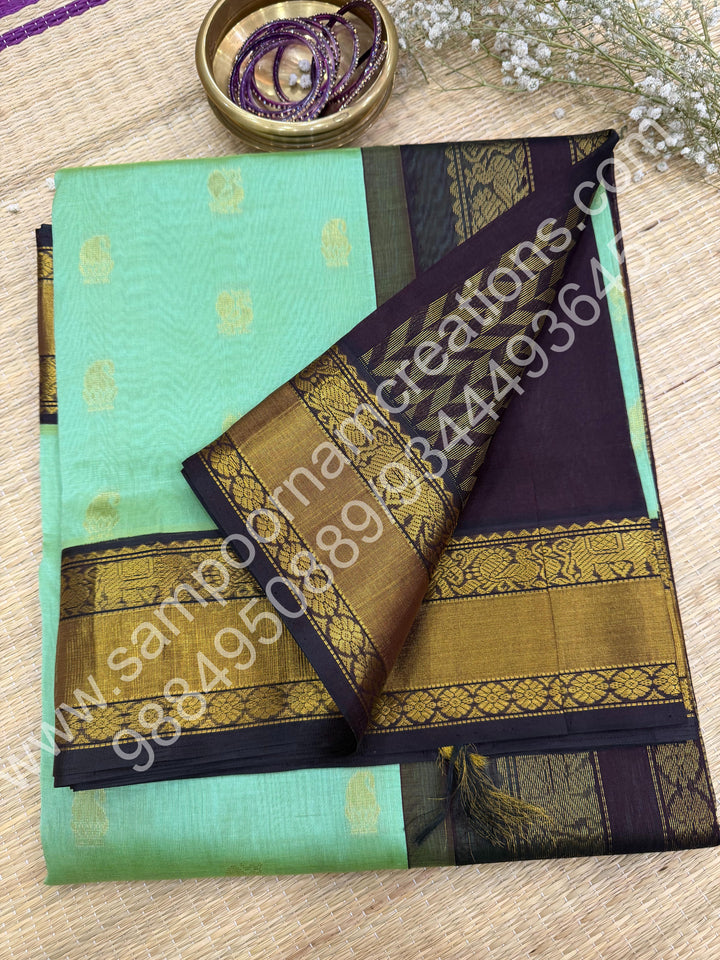 Pastel Green with Cofee Brown  , Rich Mango Zari butta with Silk Rettapet Border and Rich Pallu Pure Korvai Silk Cotton Saree